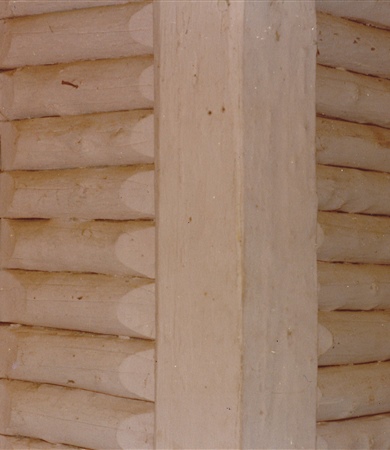 Log wall. Photo taken in 1979